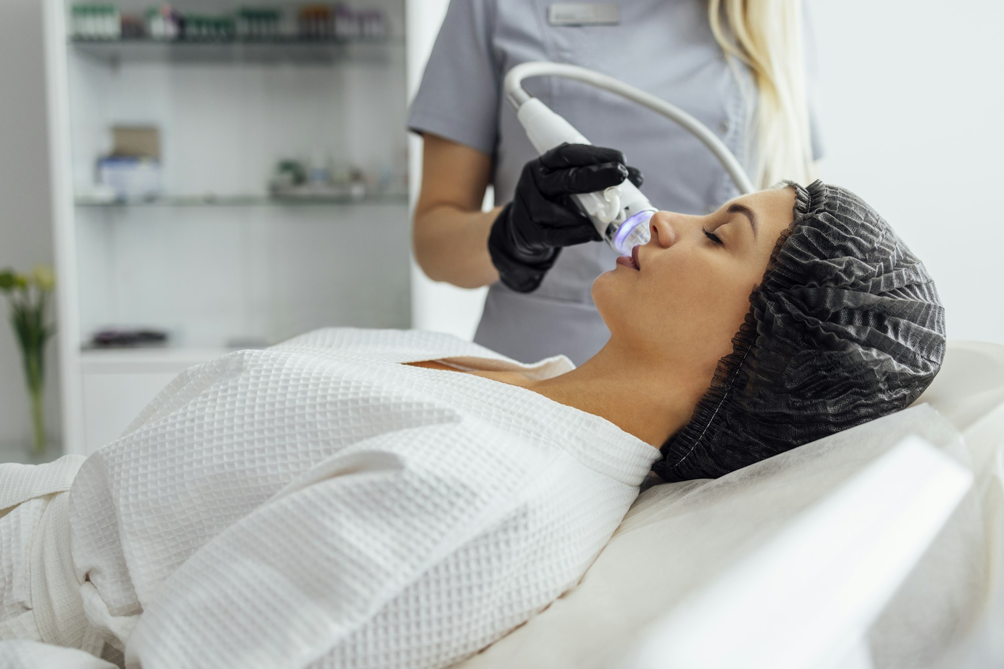 Scarlet RF microneedling device used for radiofrequency skin tightening at Hideaway